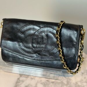 Authentic vintage Chanel black calfskin flap WOC crossbody bag